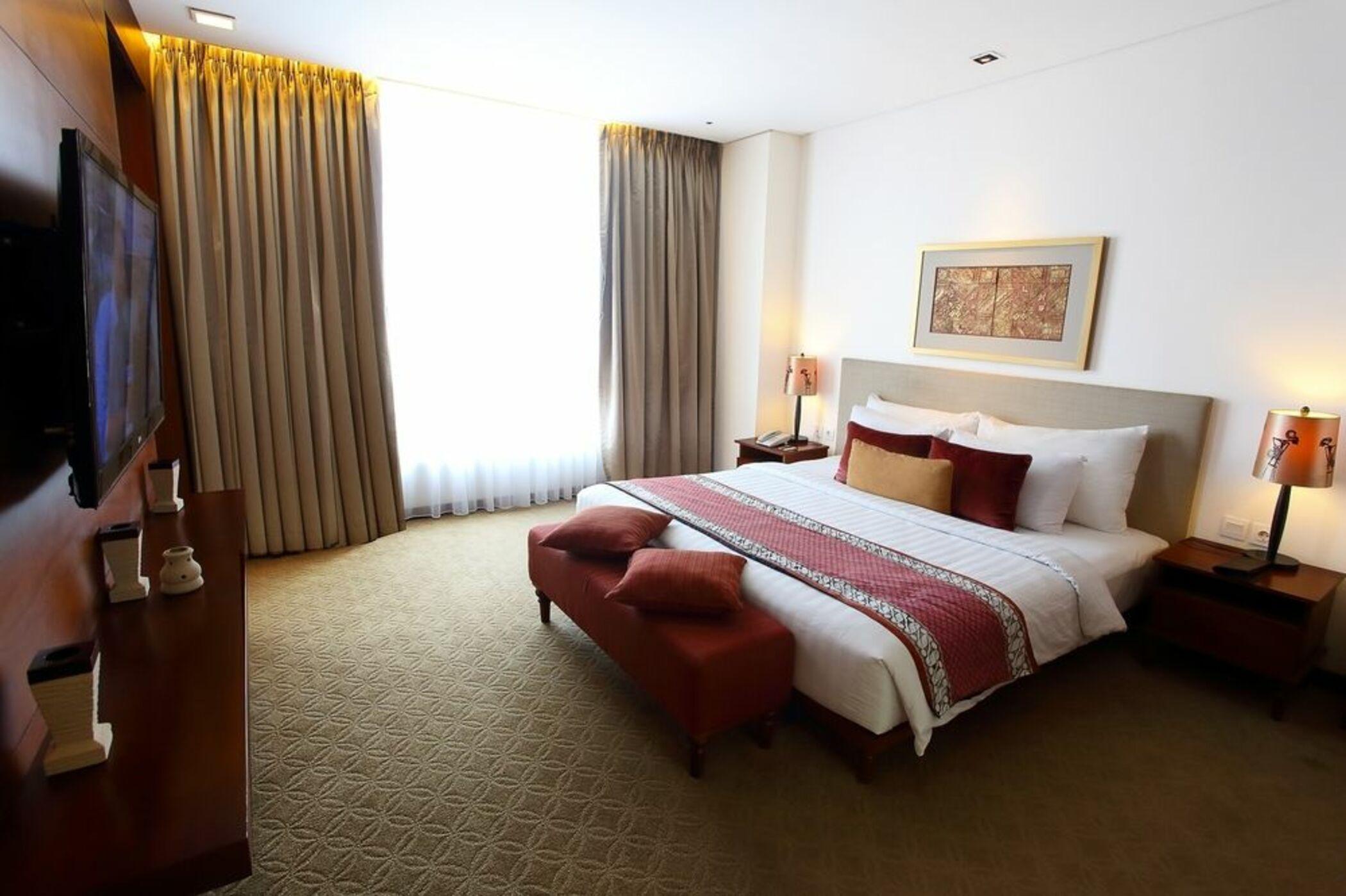 Jambuluwuk Malioboro Hotel Yogyakarta Eksteriør bilde A bedroom at the hotel